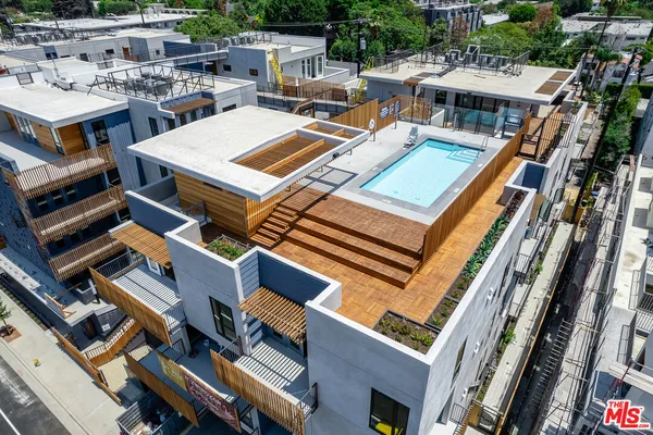a view of swimming pool with a patio
