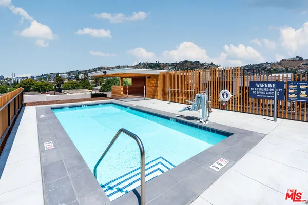 a view of a house with a swimming pool