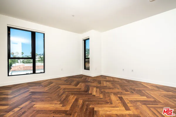 a view of a room with shelf on the wall