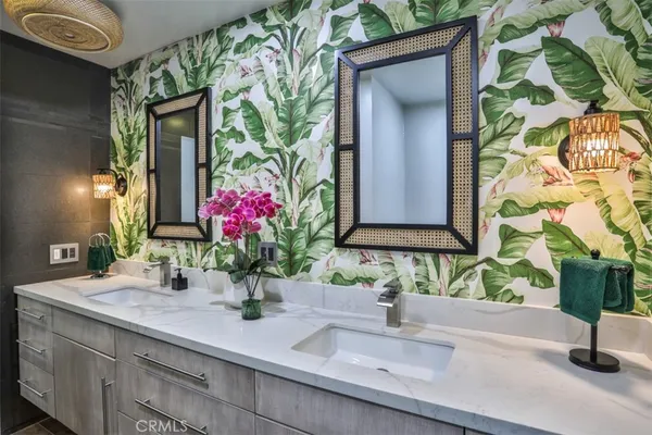 a view of a two chairs and table in a balcony