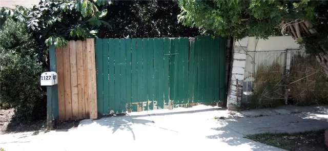 a sign that is on the side of a road