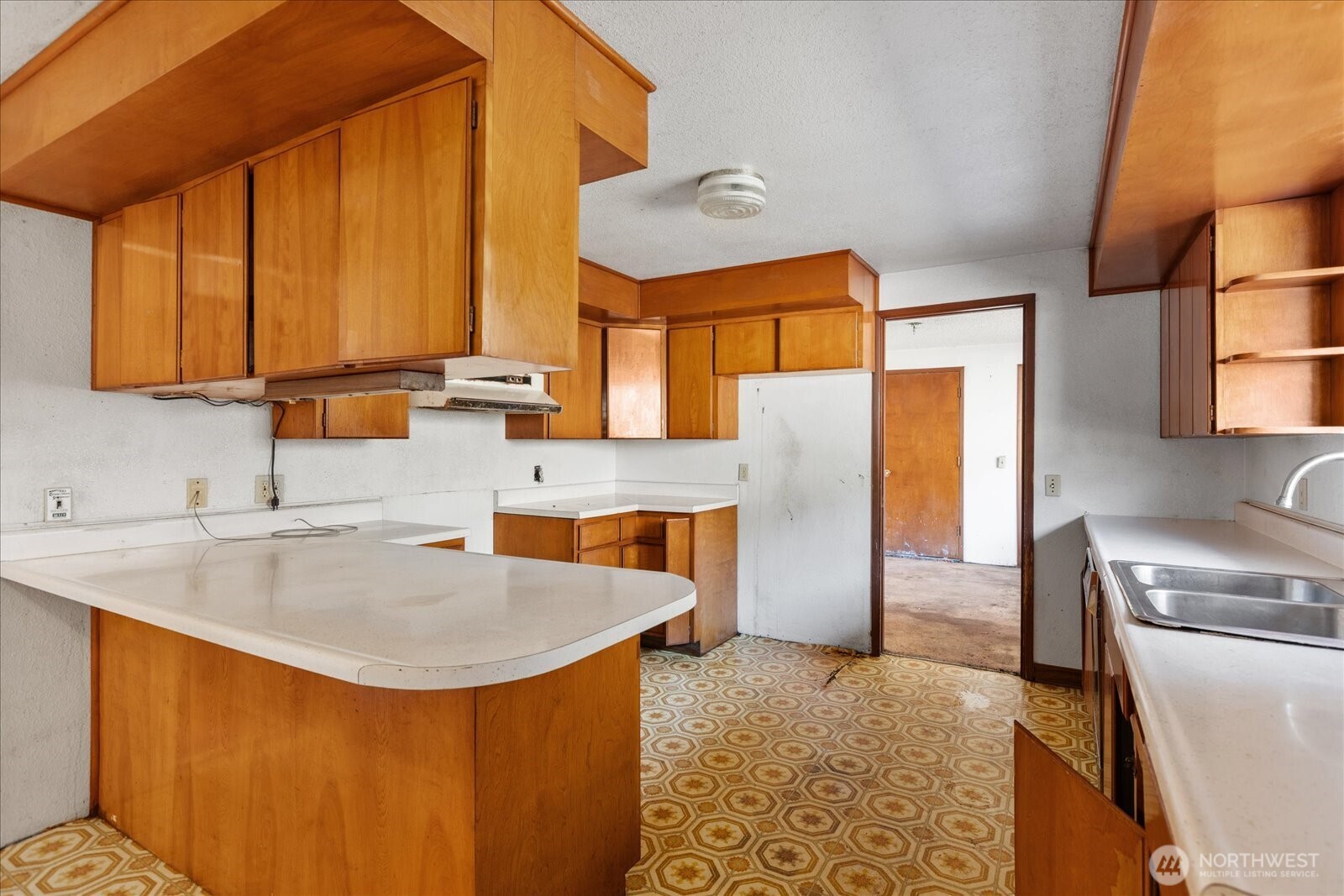 38425 Swede Heaven Road Arlington, WA 98223 - Photo 11 of 36 a kitchen with stainless steel appliances granite countertop a sink a refrigerator and a stove
