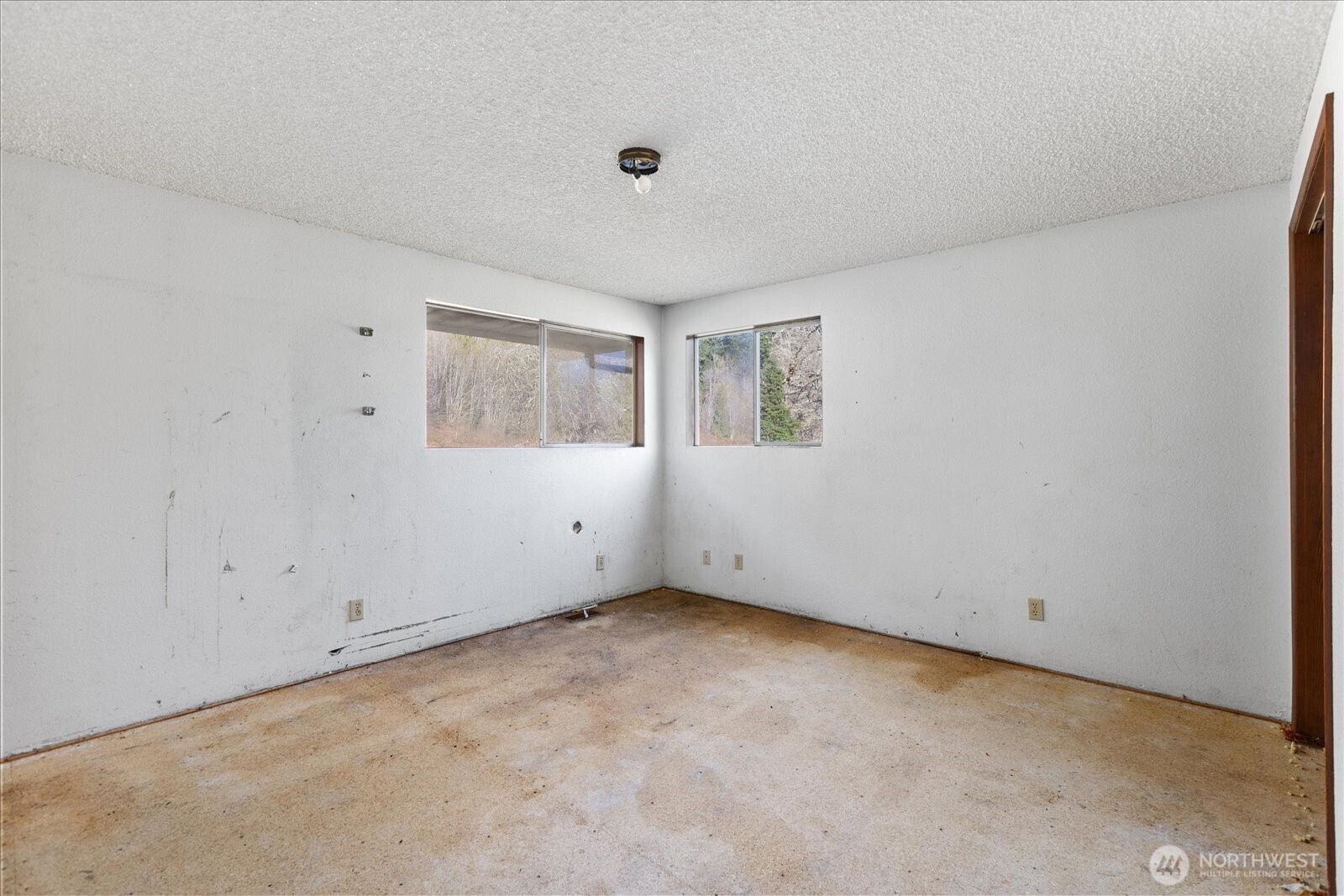 38425 Swede Heaven Road Arlington, WA 98223 - Photo 13 of 36 a view of an empty room with a window