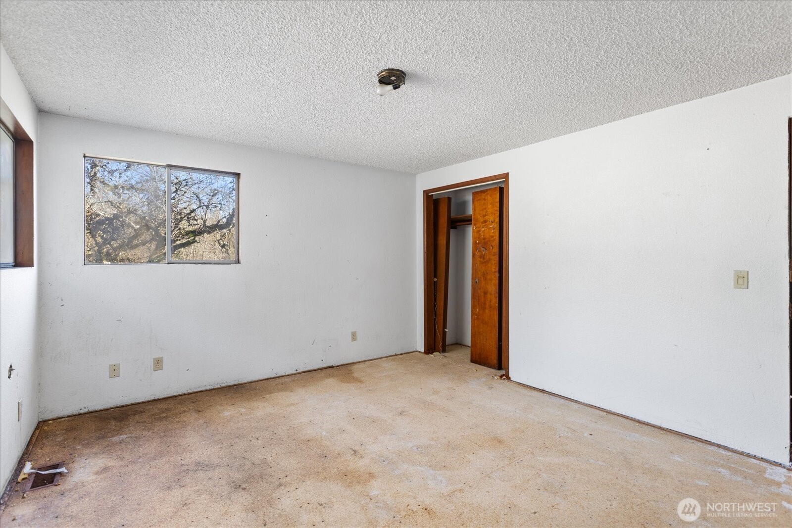 38425 Swede Heaven Road Arlington, WA 98223 - Photo 14 of 36 a view of an empty room with a window