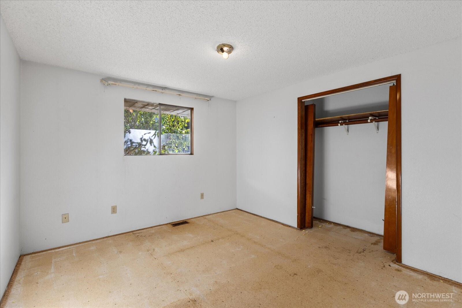 38425 Swede Heaven Road Arlington, WA 98223 - Photo 19 of 36 a view of an empty room with a window