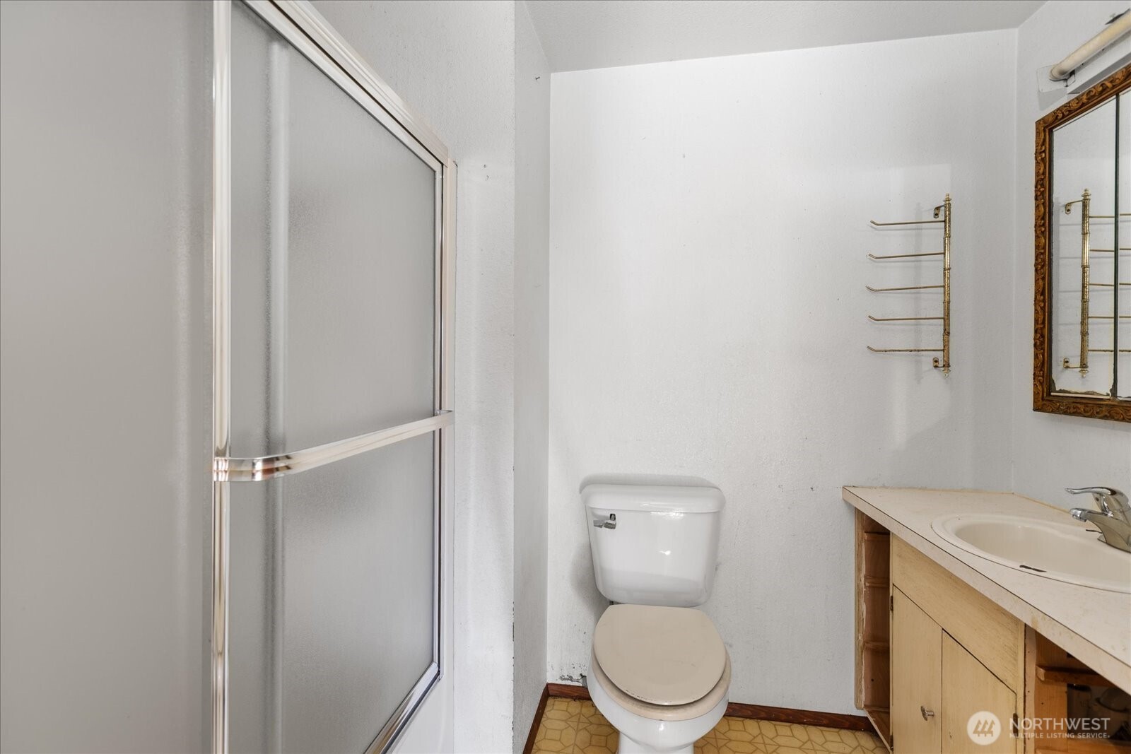 38425 Swede Heaven Road Arlington, WA 98223 - Photo 21 of 36 a white toilet sitting next to a bathroom sink