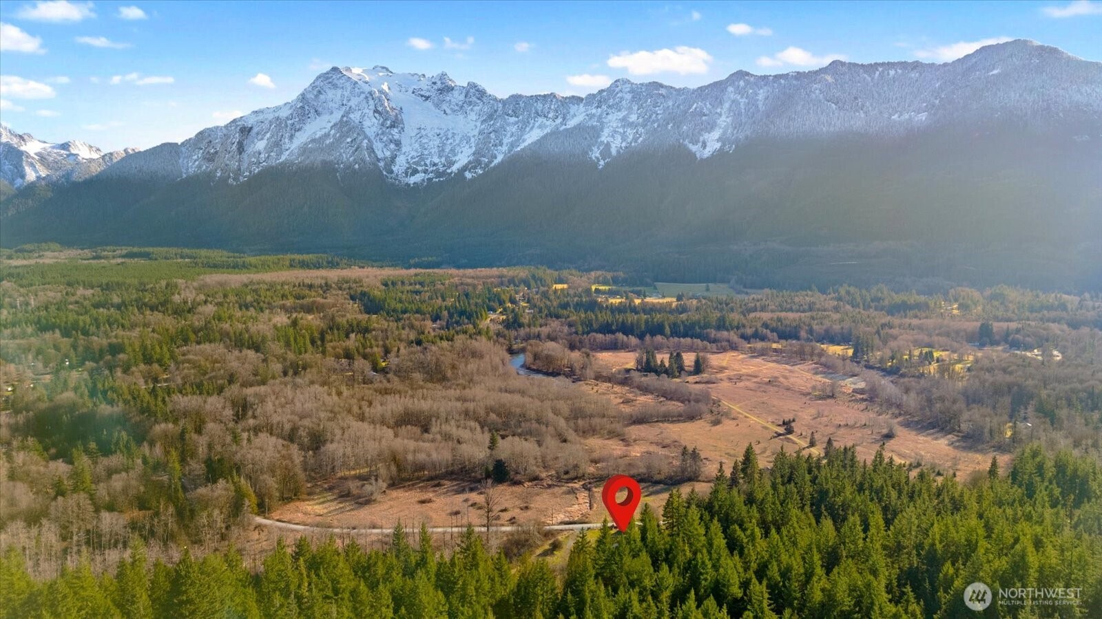 38425 Swede Heaven Road Arlington, WA 98223 - Photo 29 of 36 a view of a house with a mountain and a forest