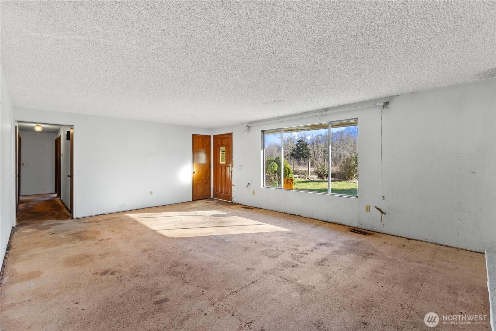 38425 Swede Heaven Road Arlington, WA 98223 - Photo 5 of 36 a view of an empty room with a window