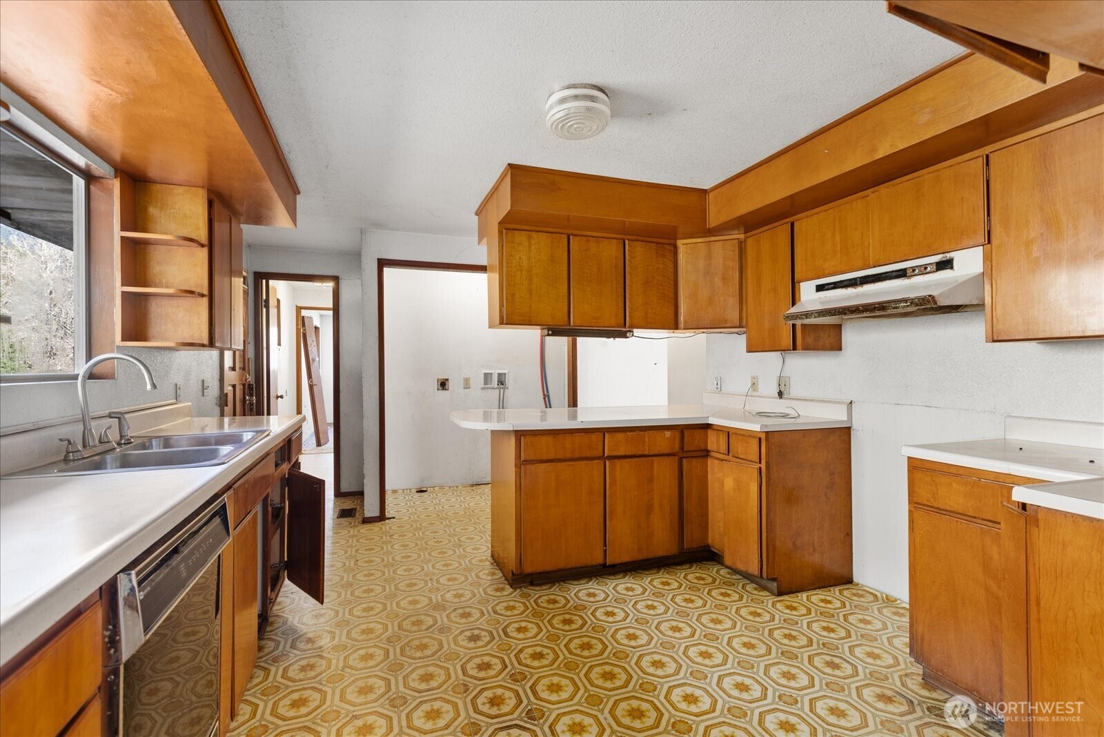 38425 Swede Heaven Road Arlington, WA 98223 - Photo 10 of 36 a kitchen with stainless steel appliances granite countertop a sink and cabinets