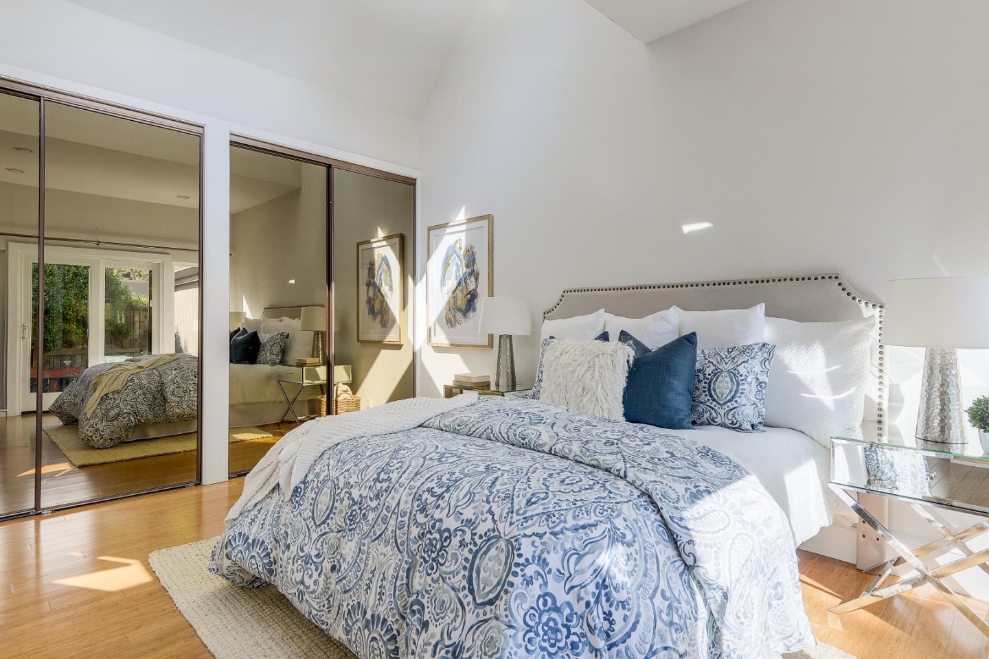 7 Farm Road Los Altos, CA 94024 - Photo 12 of 38 a large bedroom with a bed and wooden floor
