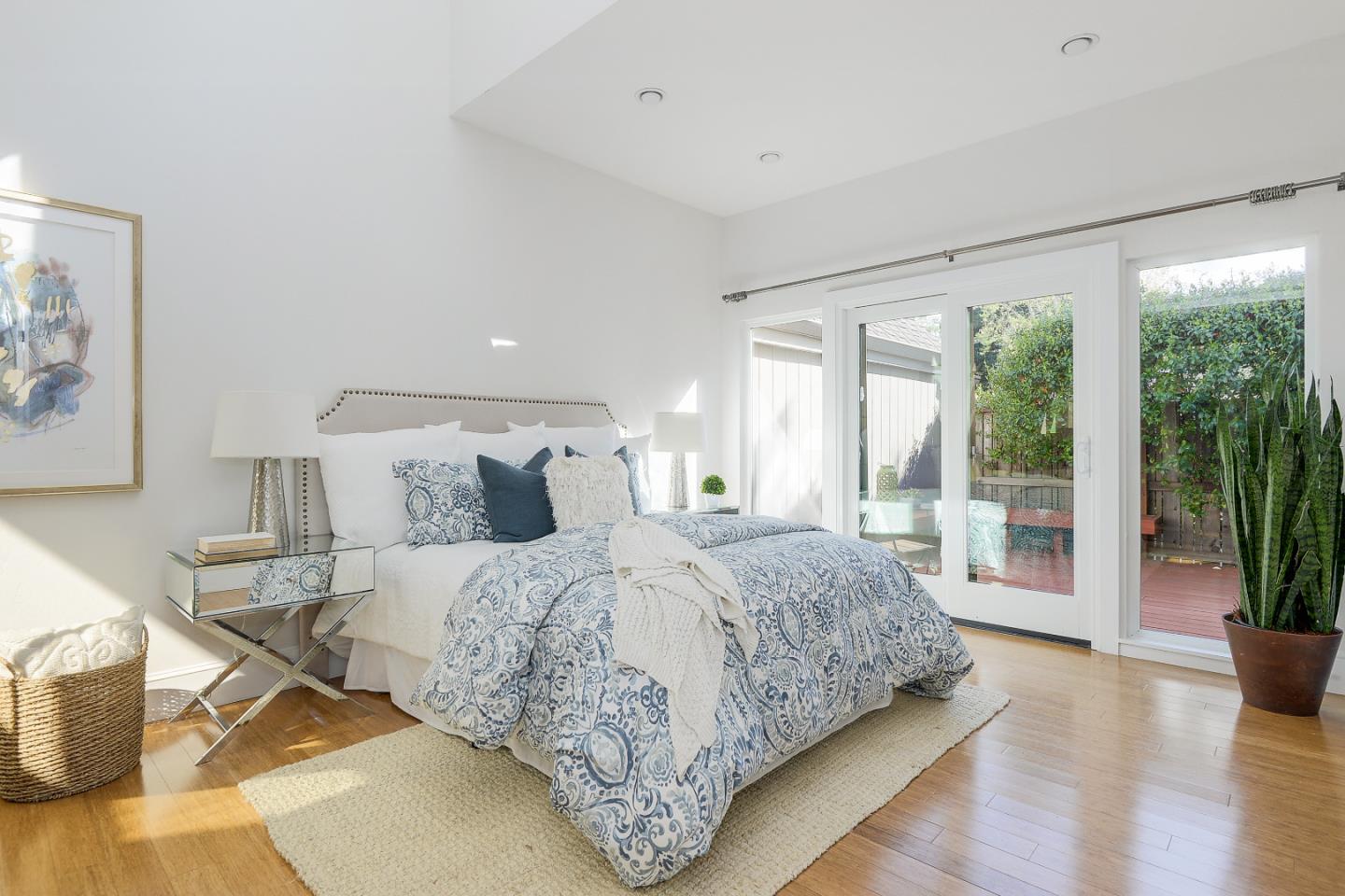 7 Farm Road Los Altos, CA 94024 - Photo 13 of 38 a bedroom with a large bed and a large window