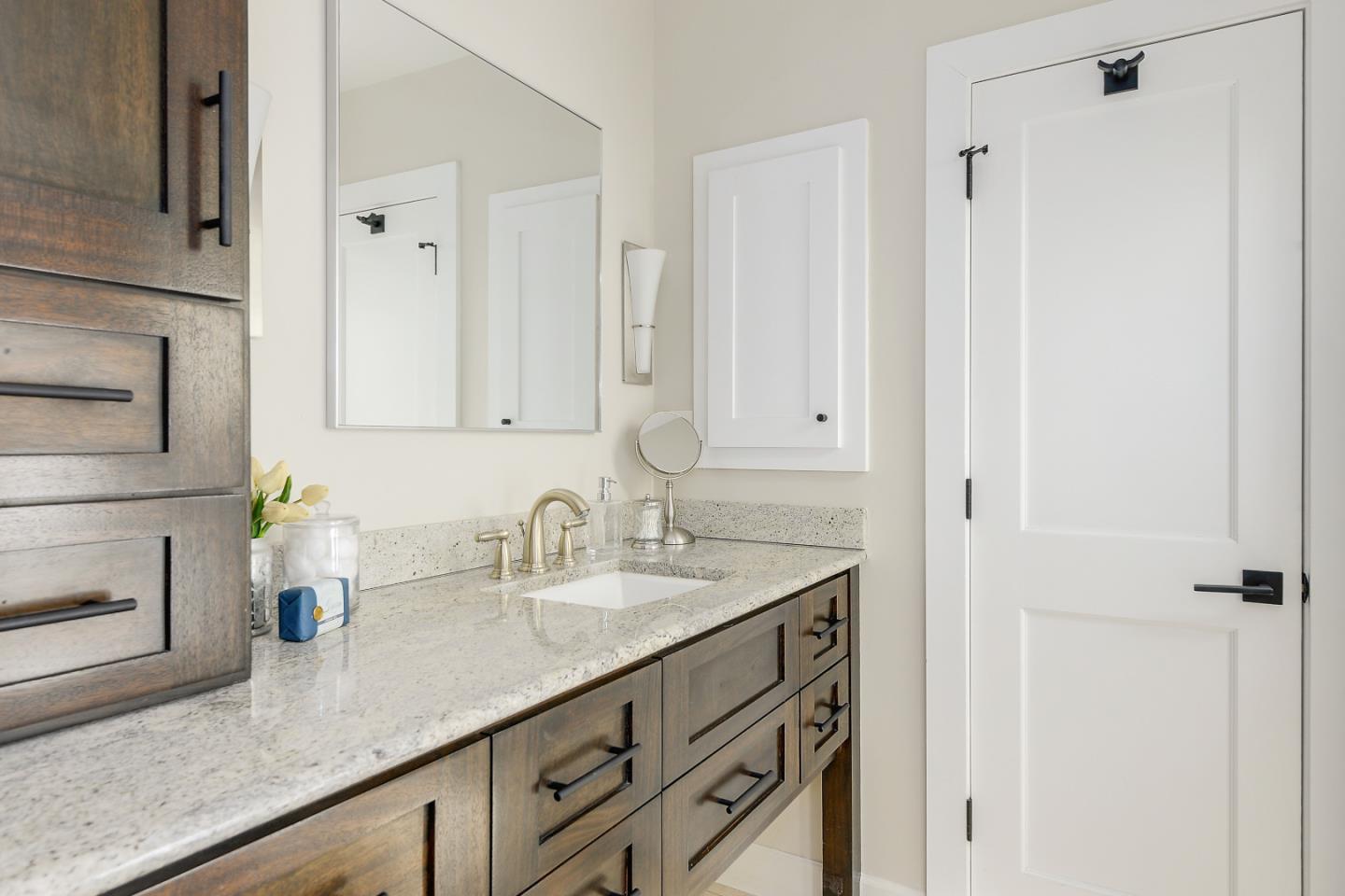 7 Farm Road Los Altos, CA 94024 - Photo 17 of 38 a bathroom with a sink and a mirror
