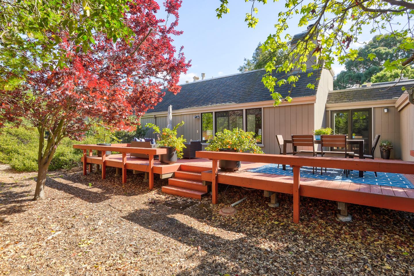 7 Farm Road Los Altos, CA 94024 - Photo 23 of 38 a view of a house with backyard sitting area and garden