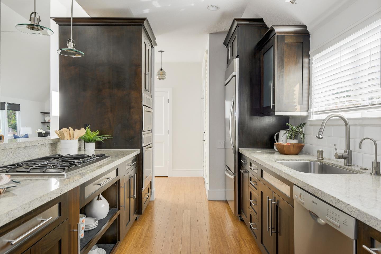 7 Farm Road Los Altos, CA 94024 - Photo 6 of 38 a kitchen with stainless steel appliances granite countertop a sink stove and refrigerator