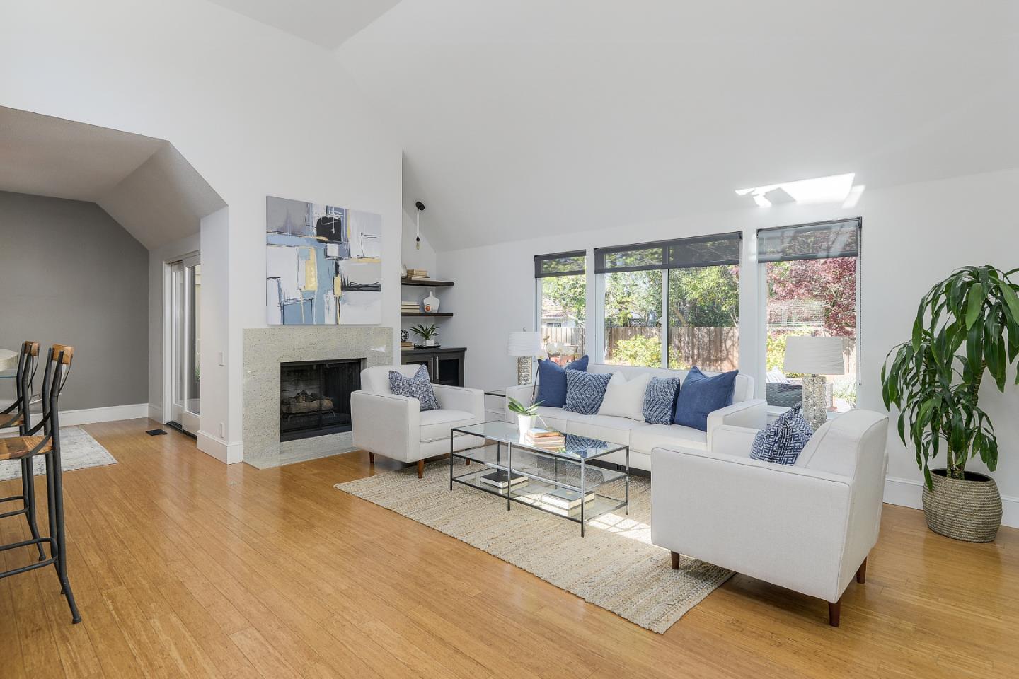 7 Farm Road Los Altos, CA 94024 - Photo 10 of 38 a living room with furniture large window and a fireplace