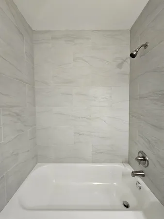 a bathroom with a bathtub