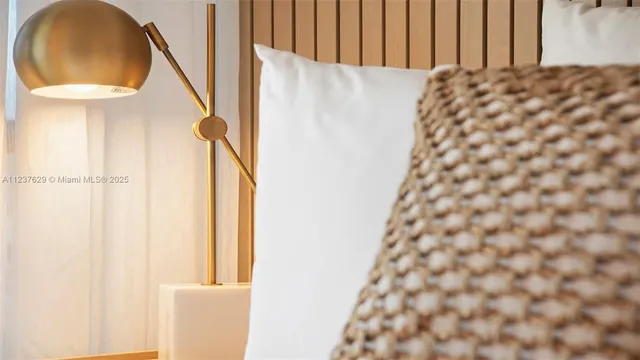 a balcony view with a large window