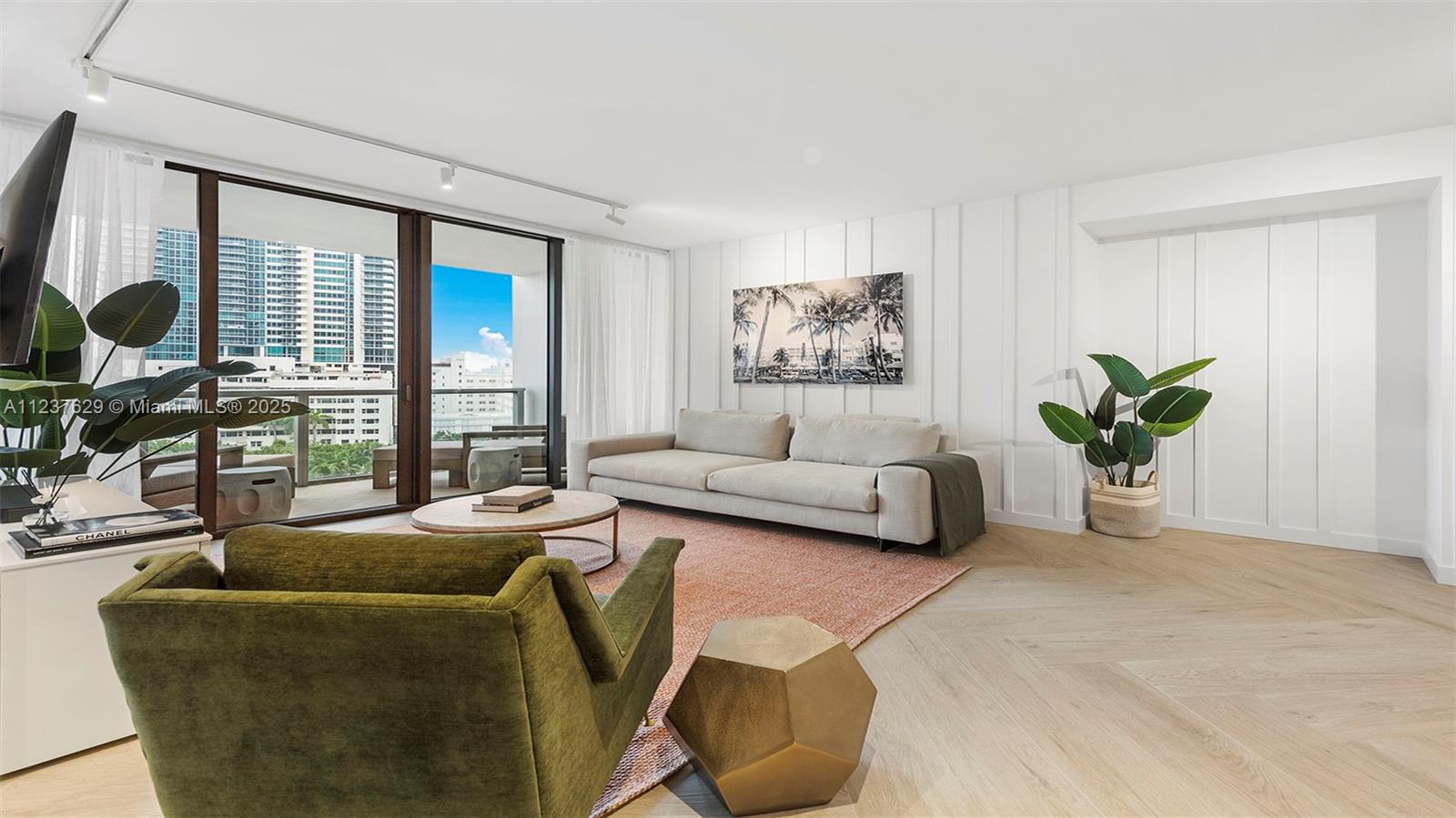 2201 Collins Avenue, Unit 804 Miami Beach, FL 33139 - Photo 6 of 41 a living room with furniture and a large window