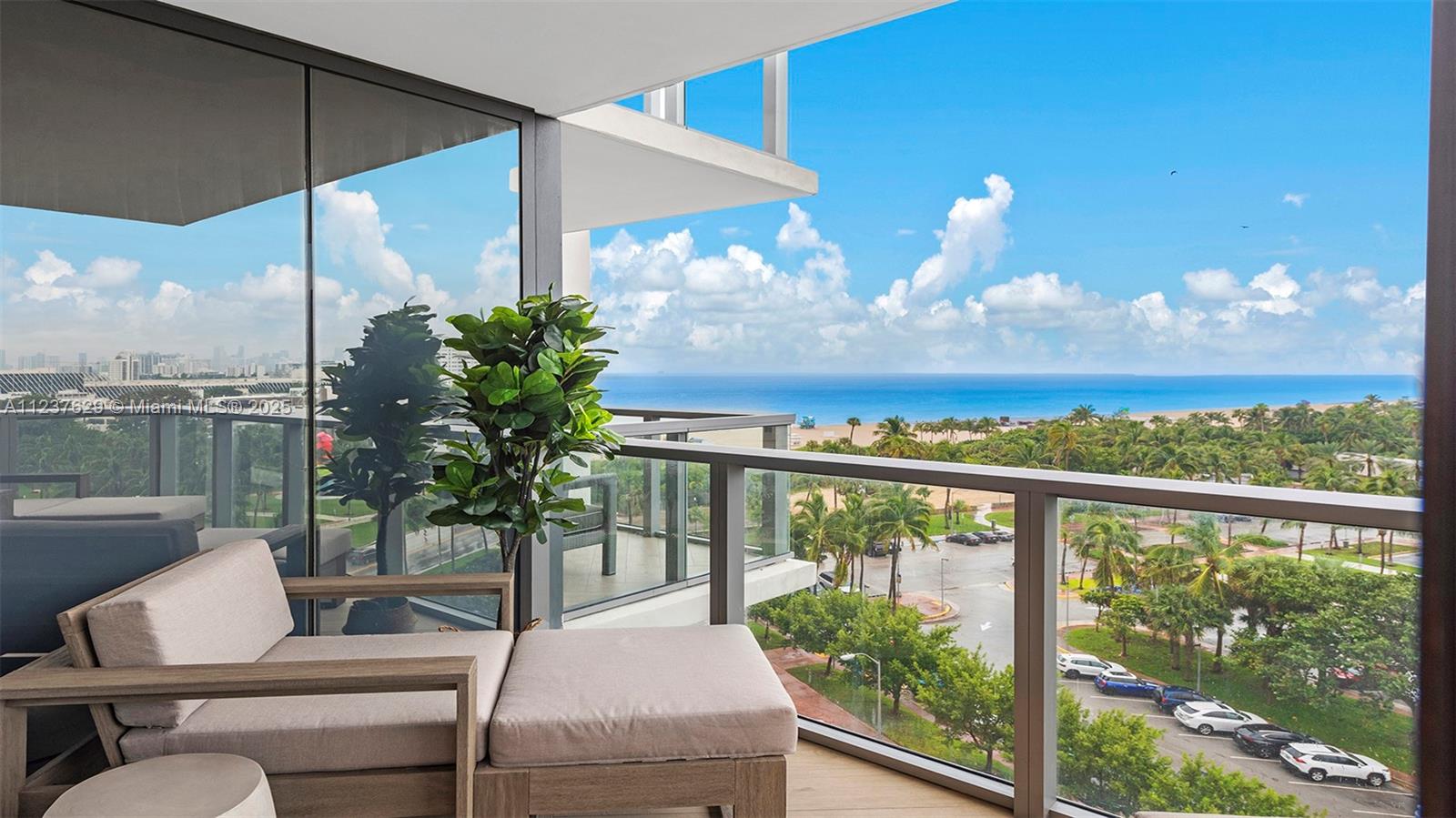 2201 Collins Avenue, Unit 804 Miami Beach, FL 33139 - Photo 7 of 41 a view of a balcony with furniture