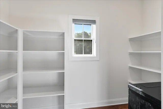 a utility room with sink dryer and washer