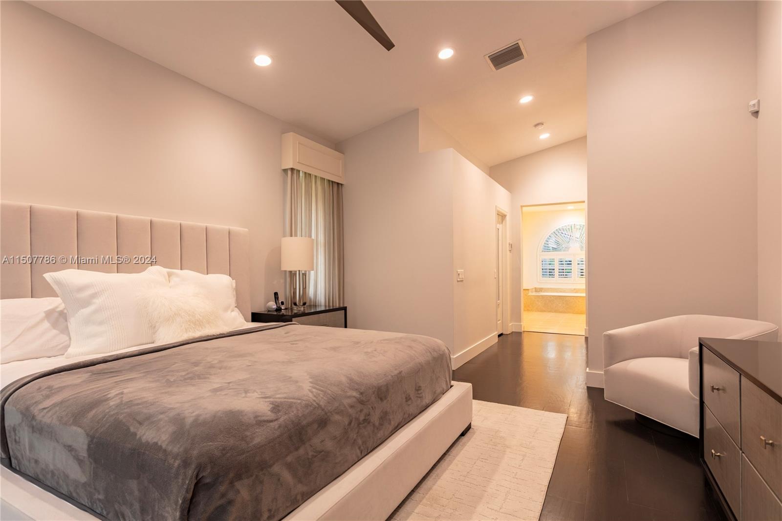 1655 Victoria Pointe Circle Weston, FL 33327 - Photo 22 of 43 a bedroom with double bed and a couch