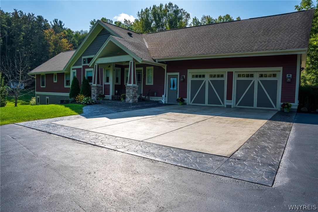 2000 Jamison Road Elma, NY 14052 - Photo 1 of 1 Front of home. Some pattern stamped concrete.