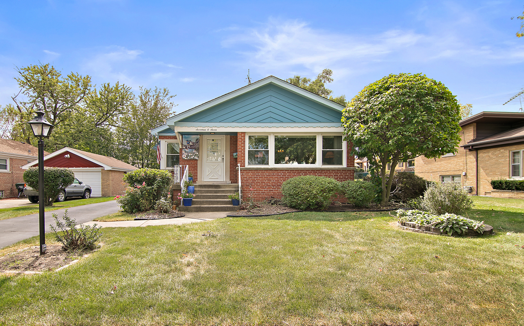 1707 Evergreen Road Homewood, IL 60430 - Photo 1 of 22 a view of a house with a yard