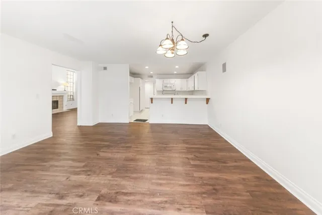 a view of a kitchen with a dishwasher and cabinets
