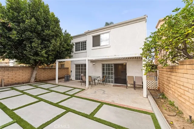 a front view of a house with a patio