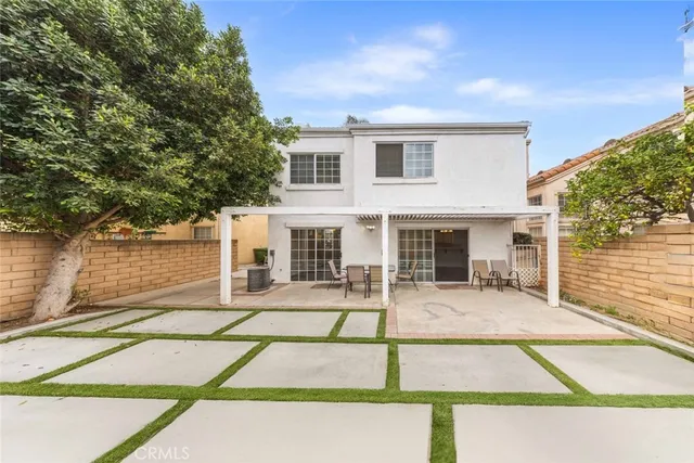 a view of a patio with swimming pool