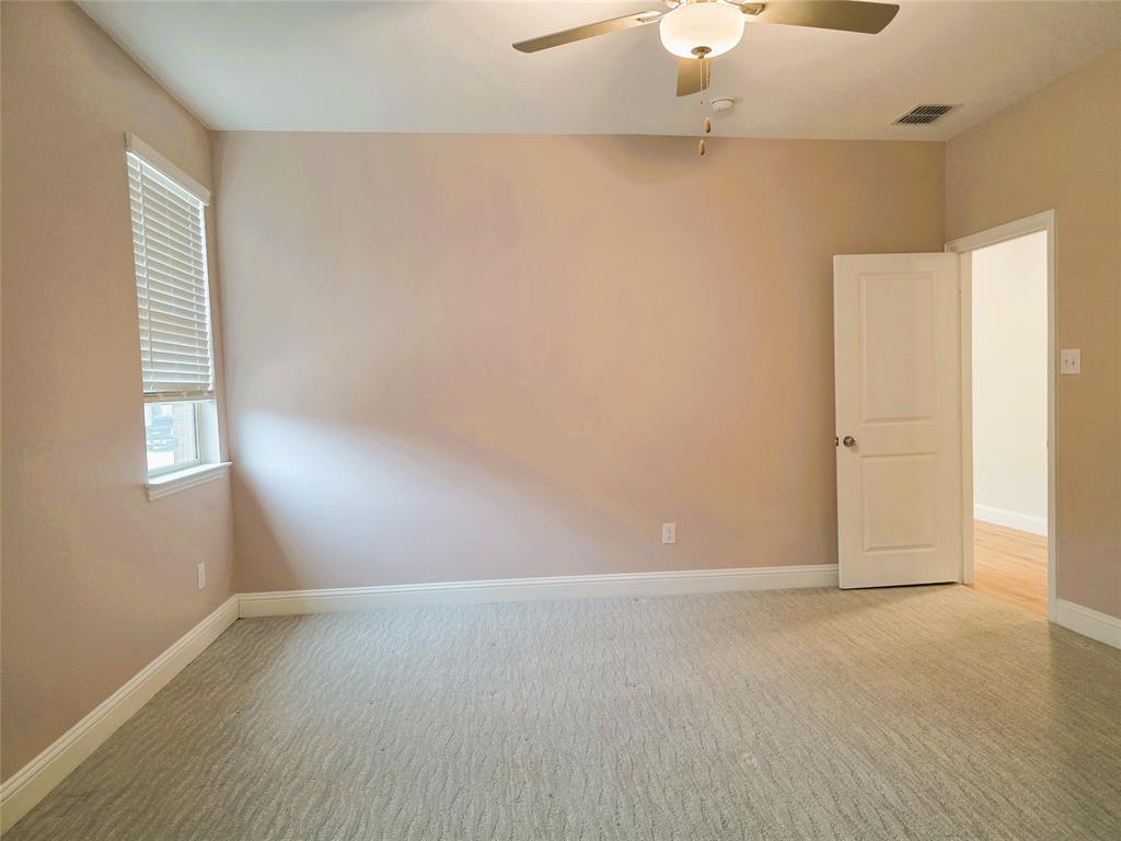 3209 Appleton Street Little Elm, TX 75068 - Photo 8 of 17 Carpeted spare room with ceiling fan and baseboards