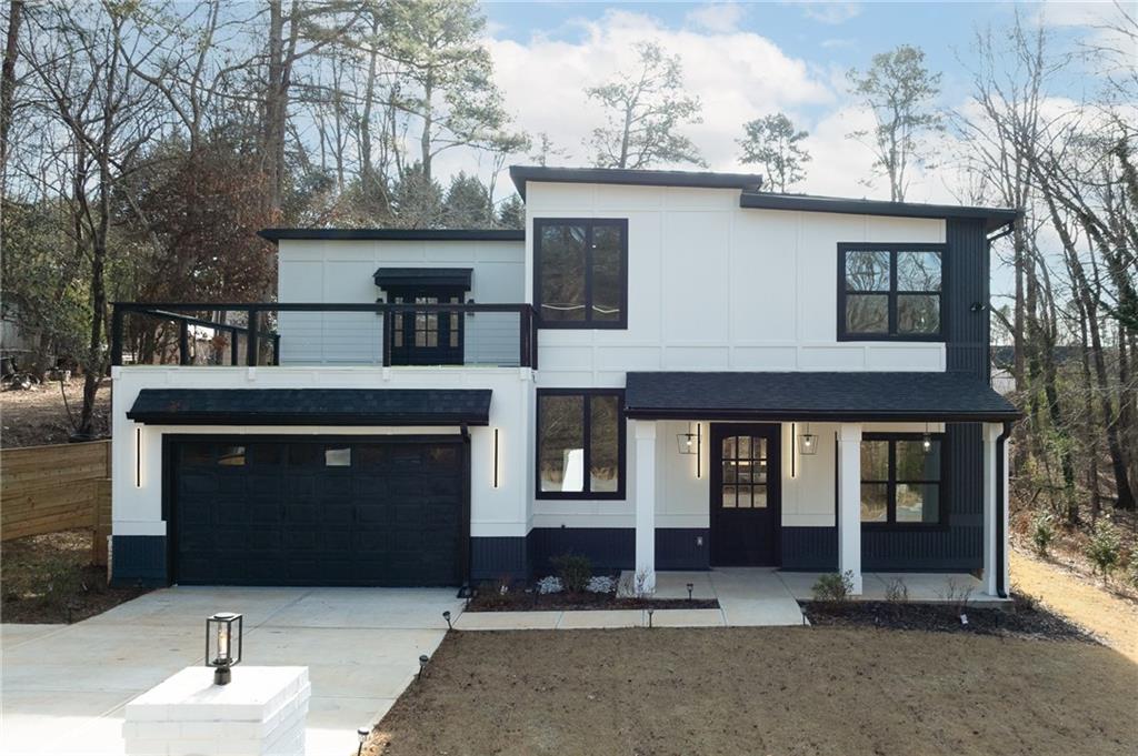 a front view of a house with yard