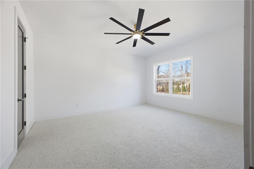 6465 Yacht Club Road Flowery Branch, GA 30542 - Photo 33 of 45 an empty room