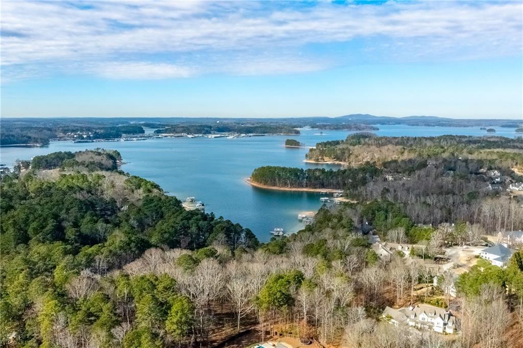 6465 Yacht Club Road Flowery Branch, GA 30542 - Photo 44 of 45 a view of lake with mountain in background