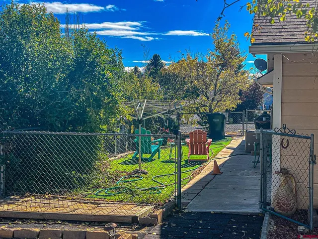 a view of a swimming pool with a deck