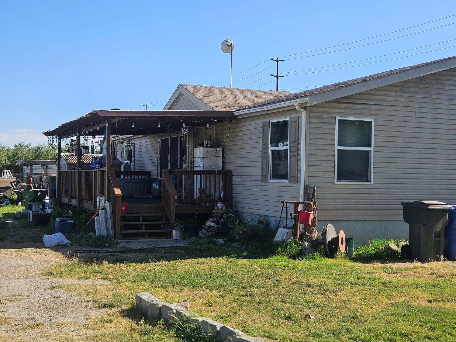 1736 South Washington Road Turlock, CA 95380 - Photo 2 of 3 a front view of house with yard