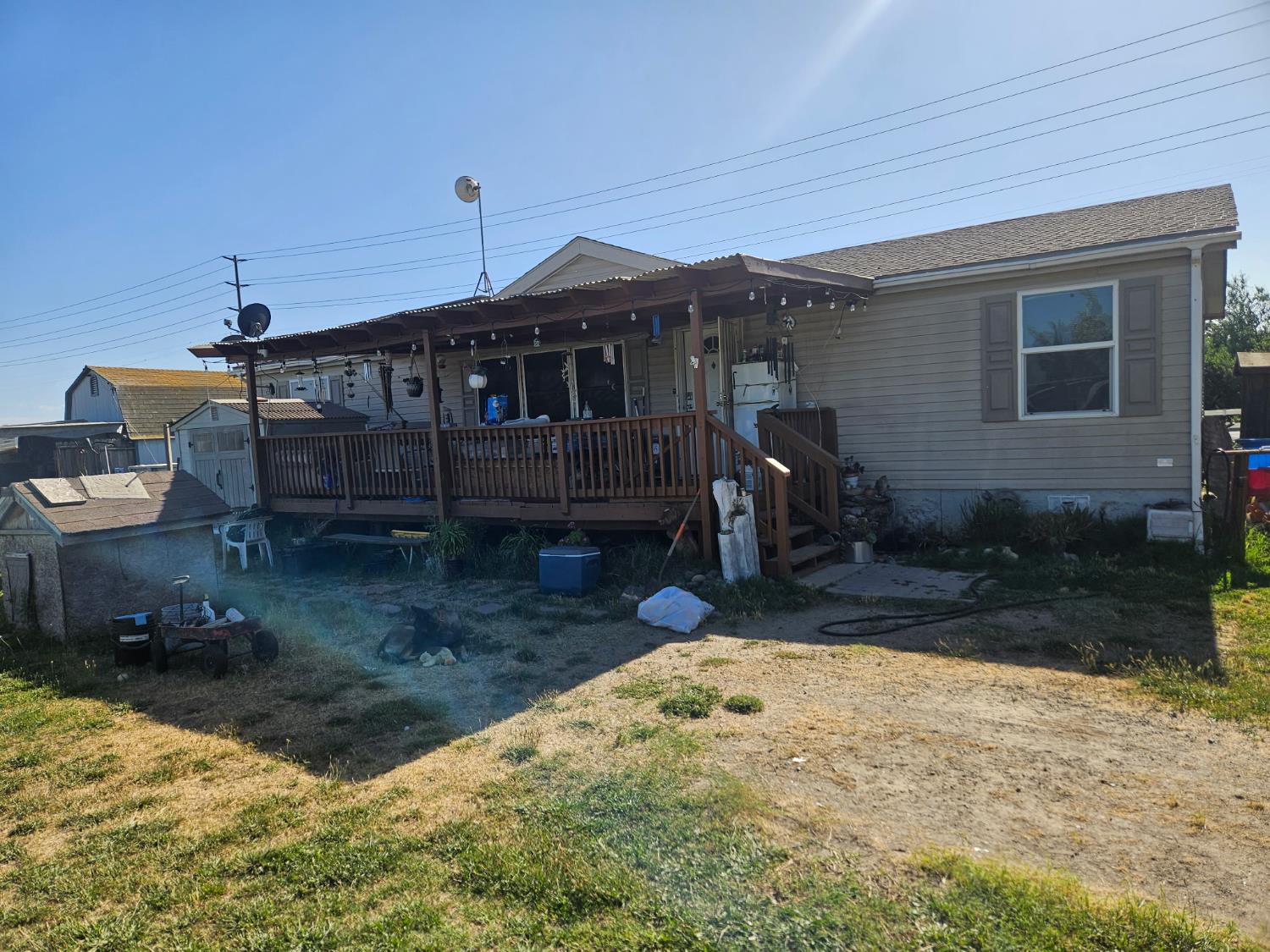 1736 South Washington Road Turlock, CA 95380 - Photo 3 of 3 a front view of a house with a yard