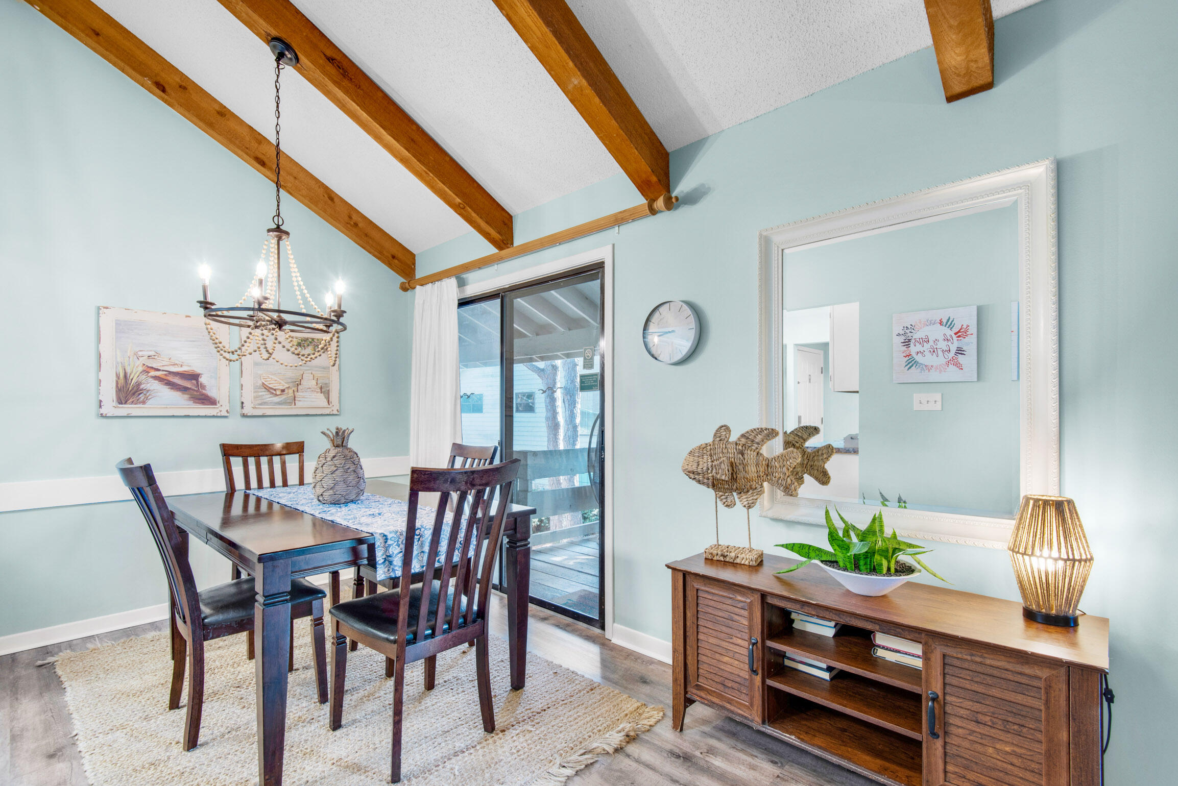 140 Sunset Bay, Unit 12D Miramar Beach, FL 32550 - Photo 11 of 29 a dining room with furniture and wooden floor