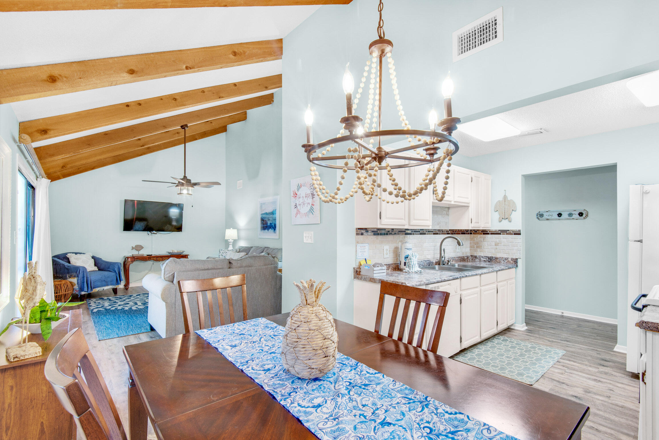 140 Sunset Bay, Unit 12D Miramar Beach, FL 32550 - Photo 12 of 29 a dining room with furniture and wooden floor