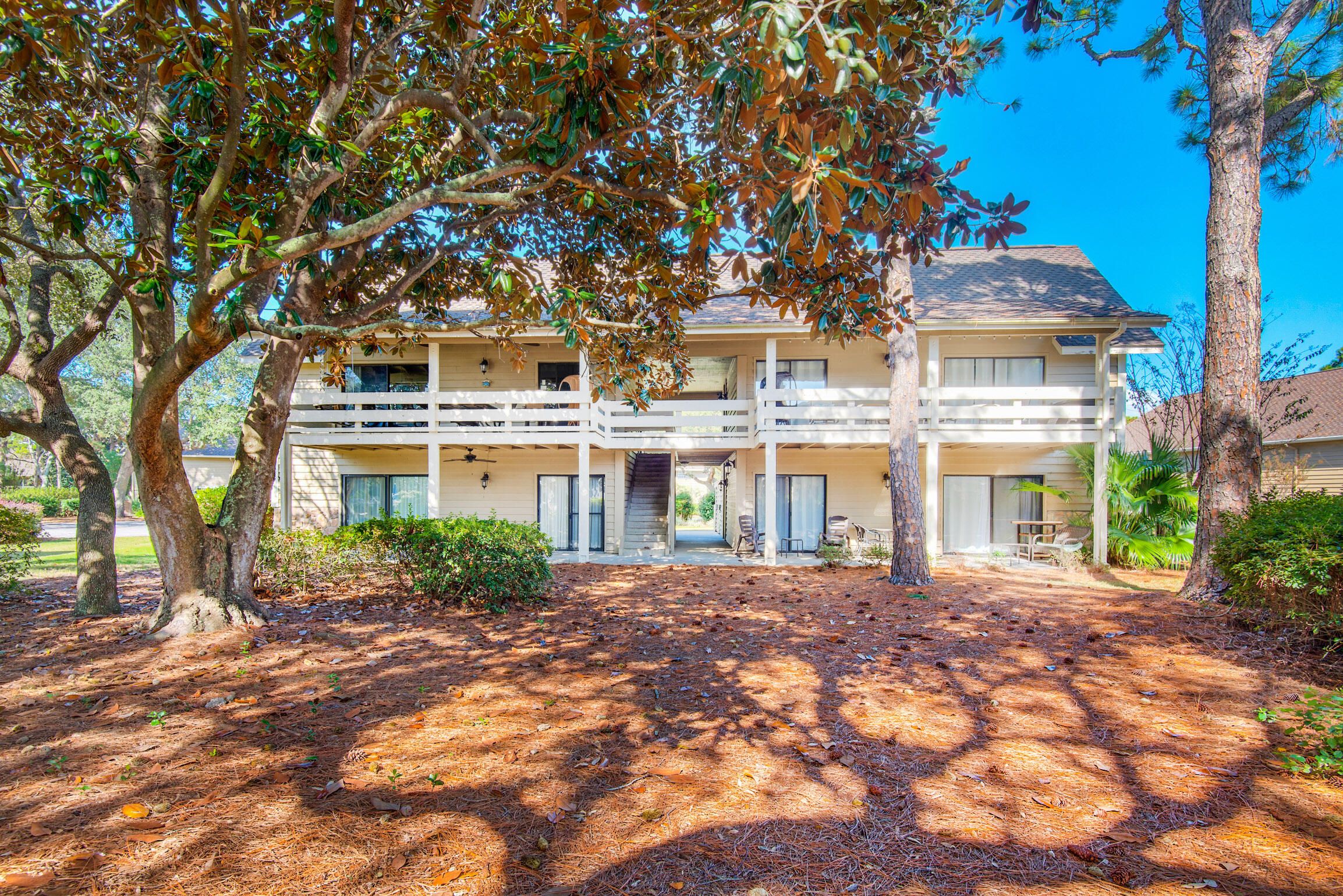 140 Sunset Bay, Unit 12D Miramar Beach, FL 32550 - Photo 5 of 29 front view of a house with a yard