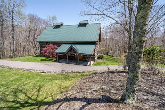 a view of a chairs with wooden walls
