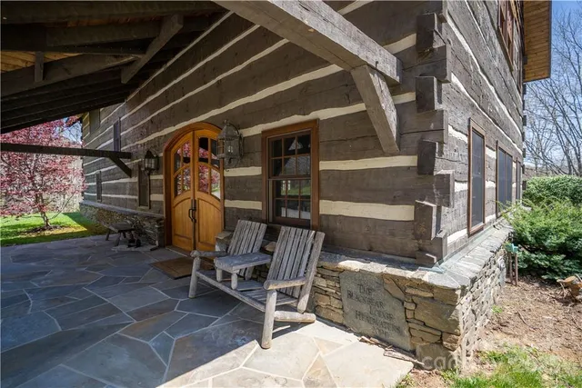 a view of a deck with furniture