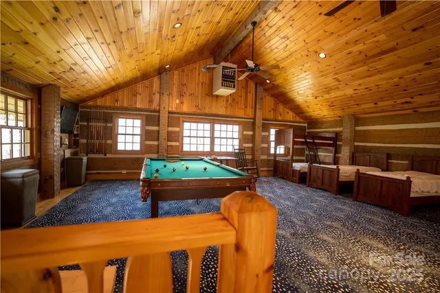 a view of a backyard with large tree