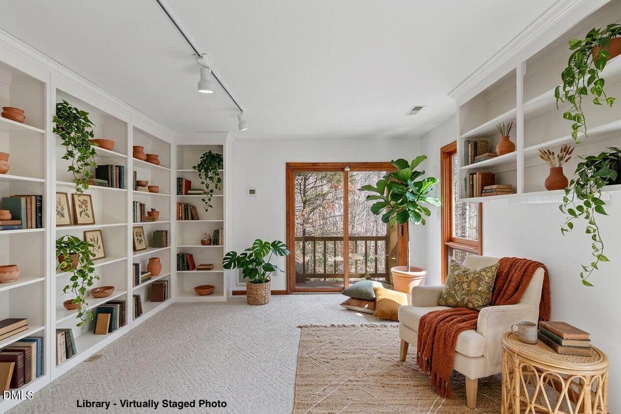 2012 Raccoon Run Clayton, NC 27520 - Photo 7 of 89 LIBRARY Virtually Staged