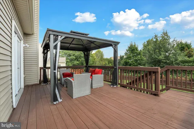 a view of a deck with wooden floor and outer view