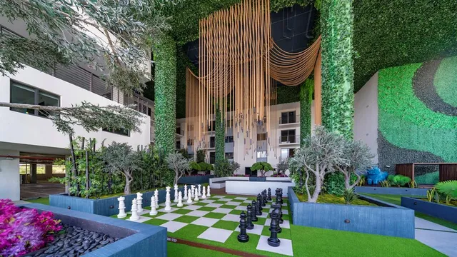 a kitchen with a refrigerator sink and microwave