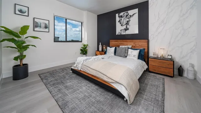 a view of a balcony with furniture