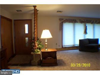 3474 Finland Road Pennsburg, PA 18073 - Photo 4 of 12 a bathroom with a sink and a mirror