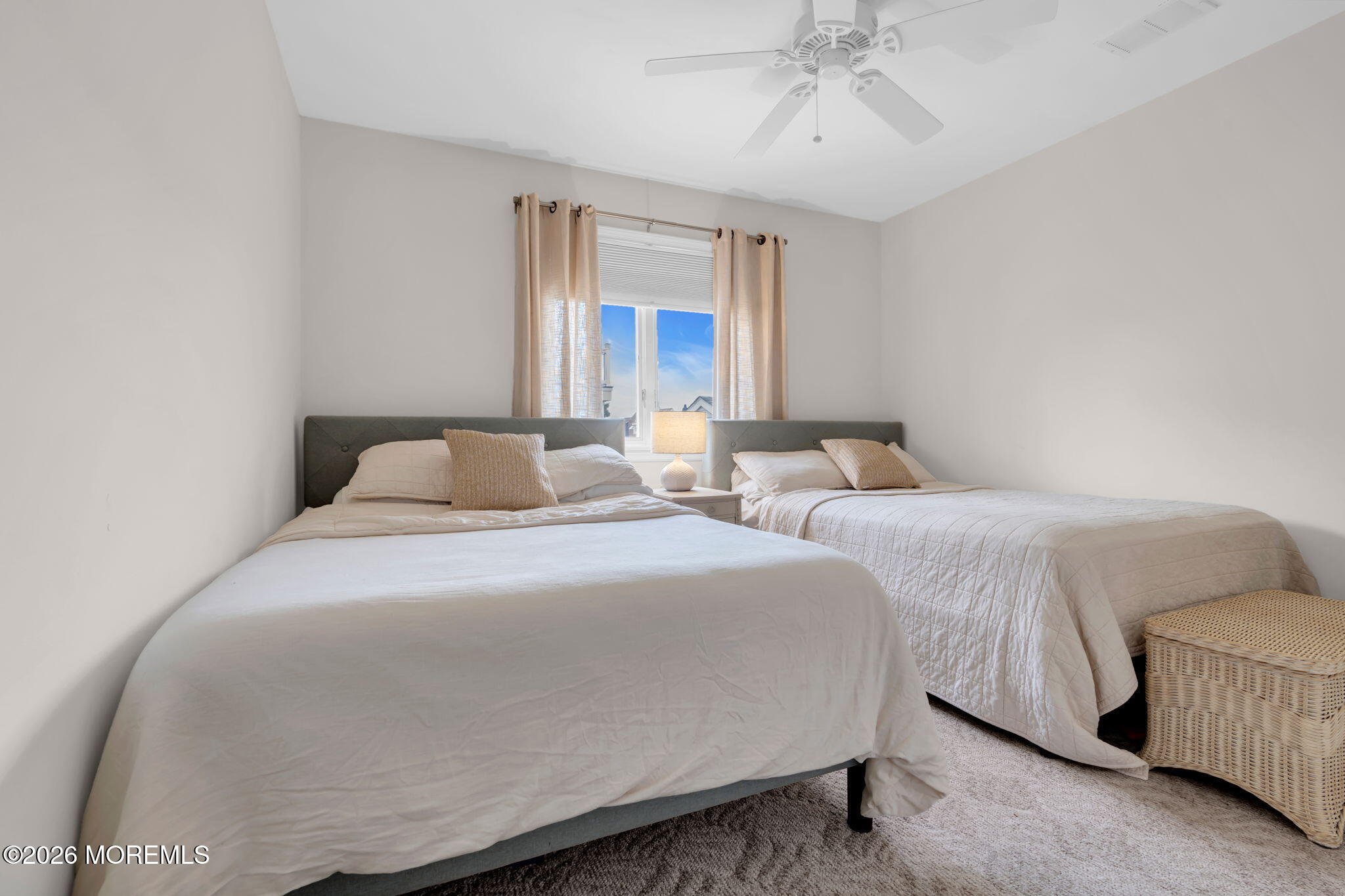 29 Green Island Road Toms River, NJ 08753 - Photo 22 of 63 a bedroom with two beds and a chandelier
