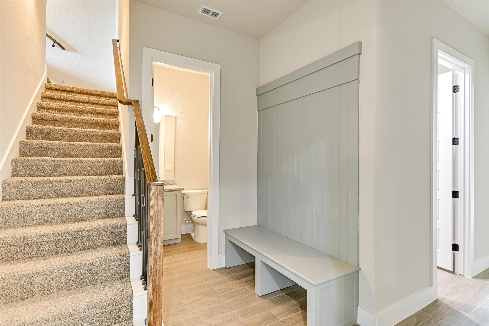 31 Peace Pipe Wimberley, TX 78676 - Photo 8 of 20 Mudroom featuring wood finish floors and baseboards